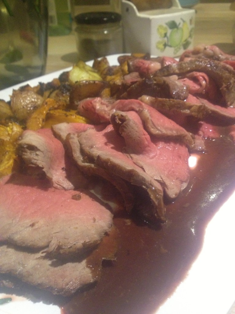 I like mine heaps pink, but the good thing about this kind of roast is it will be a little rarer in the middle so that bit's for Dr. Chris and myself and Jennee gets the end bits...