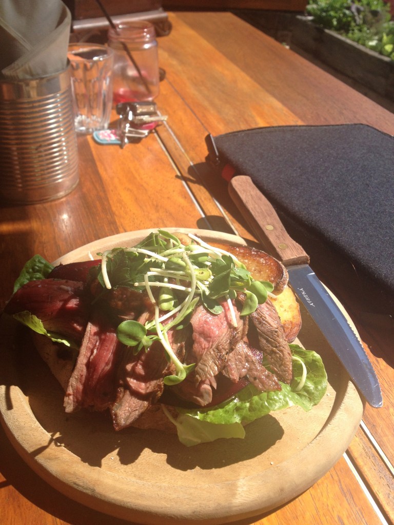 Rare rump, pickled beetroot, coleslaw, aioli and a smoky bbq sauce/ chutney on sourdough, with pan fried kipfler potatoes. I think it was 18 bucks. There was a bit of good looking food floating about the place