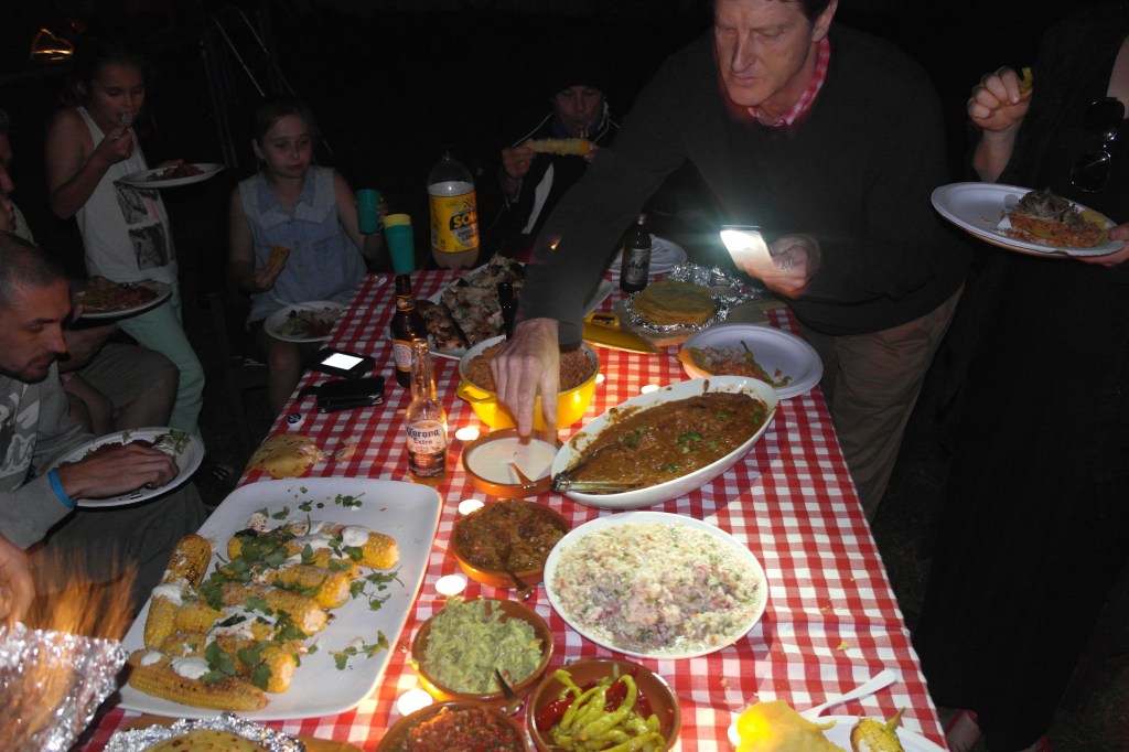 Too many good things on one table; 12 hour shoulder of pork with beer and spices, chicken mole, red rice, corn with cheese and chilli powder, home made tortillas, guacamole, pickled 'slaw, salsas, pickled chilli... some recipes will follow