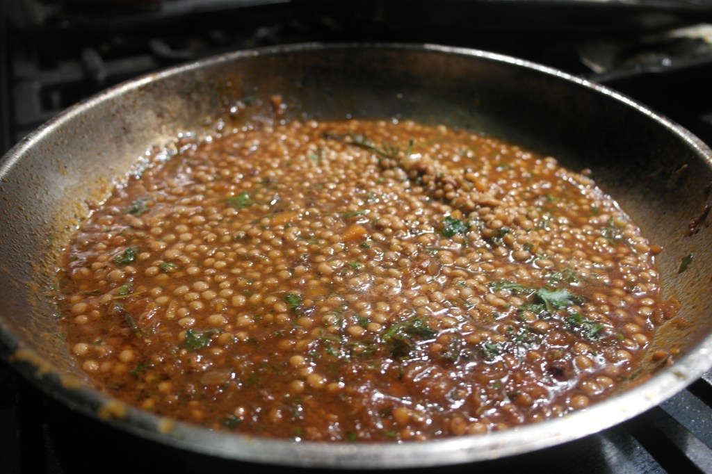 Cook the tomato and lentil sauce