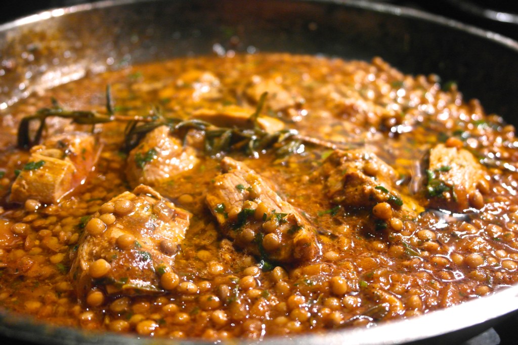 Add the pork to the tomato and lentil sauce