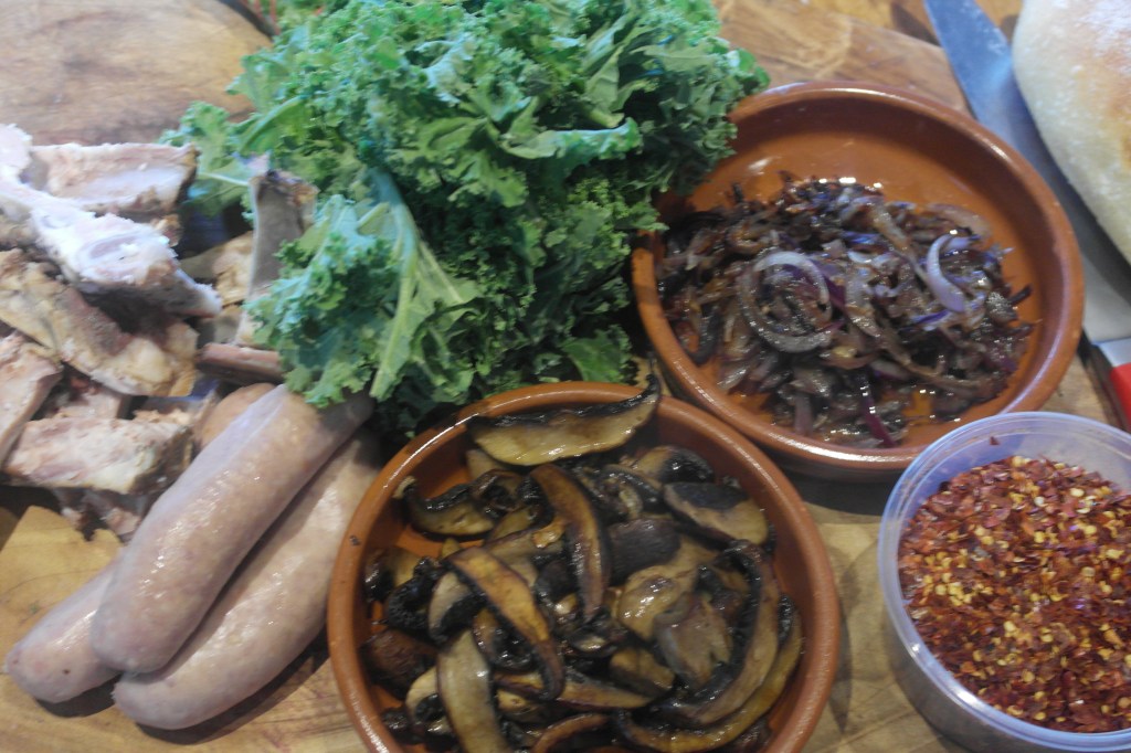 Duck sausage, pork rib, mushroom and kale pasta