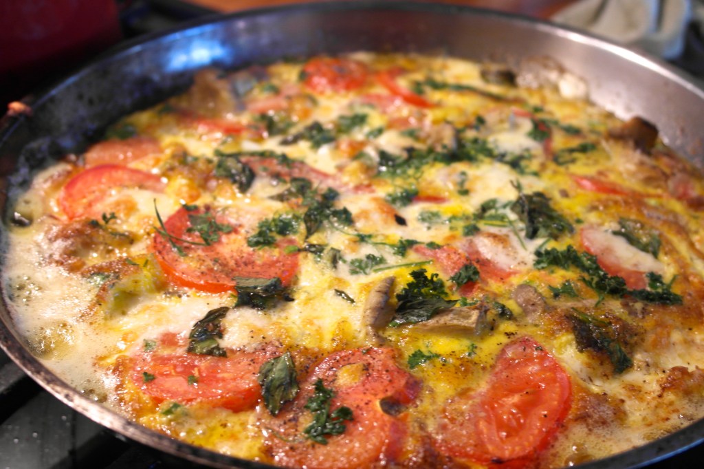 Tomato, mushrooms, cheese and herbs… and fully made by the kids to boot