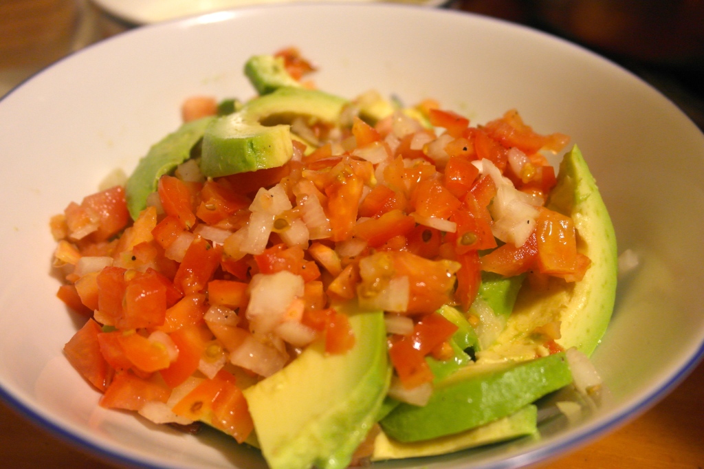 Tha avocado and tomato salad. Dressed with a little red wine vinegar, seasoning and olive oil