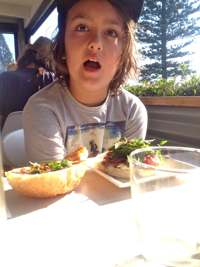 Seba waiting for me to get some black pud into his breaky burger