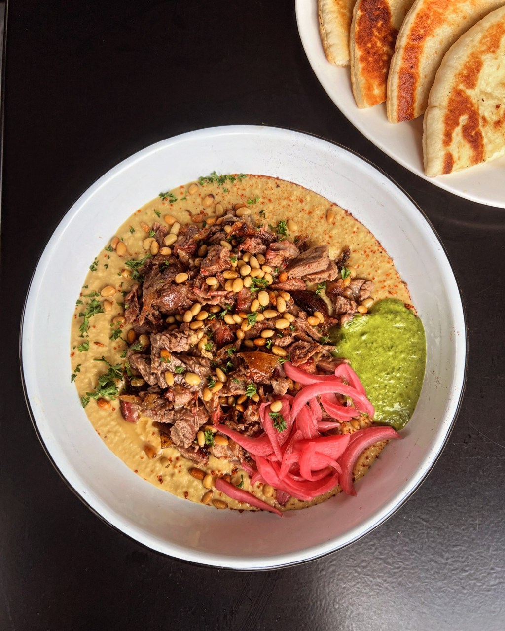 Smoked lamb shoulder with Middle Eastern sorta&nbsp;garnish